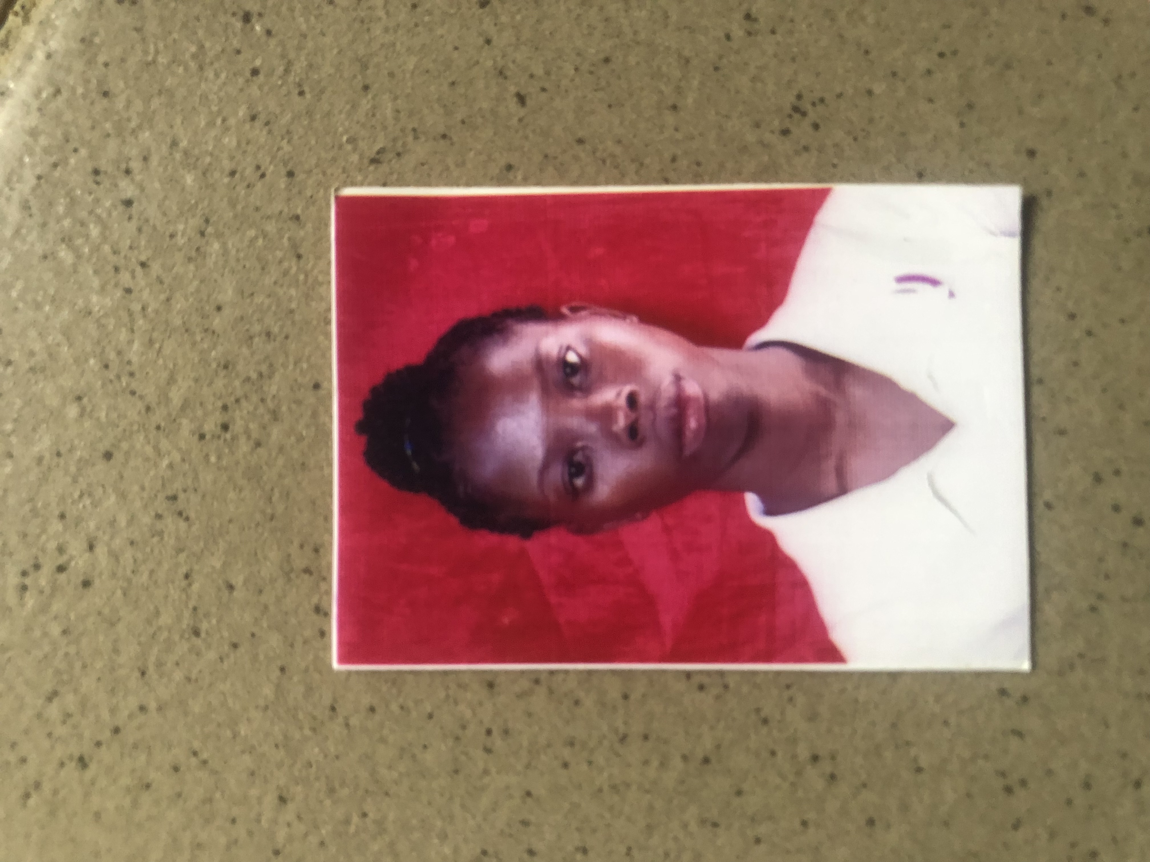 Passport for Okoloba Emomotimi